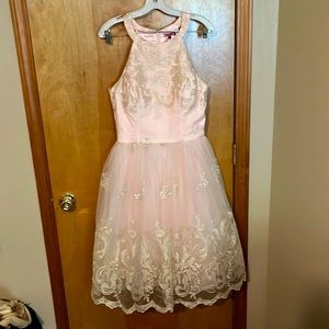 Chi chi brand. Size is 12. Beautiful blush, and gold filigree design.